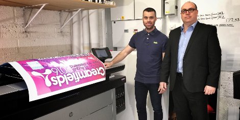 GoCre8’s Paul Lin (L) with Stanford Marsh’s Julian Mennell (R), alongside the new HP PageWide XL5000 printer.
